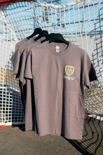 Load image into Gallery viewer, GREY TSHIRT with SMALL EMBLEM FRONT.
